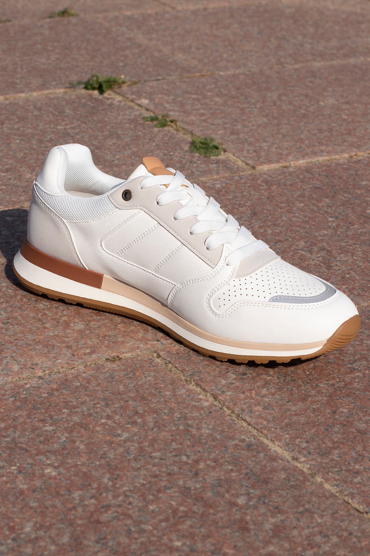 THE SANTOS ESSENTIAL SNEAKER